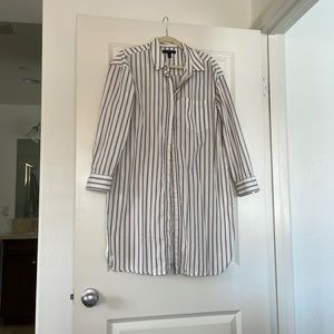 Shirt dress. Never worn- but washed.